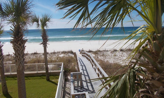 Panama City Beach Condo | PANORAMIC Oceanfront Views 4 bd Condo at 2 bd rates FREE RESERVED Beach service