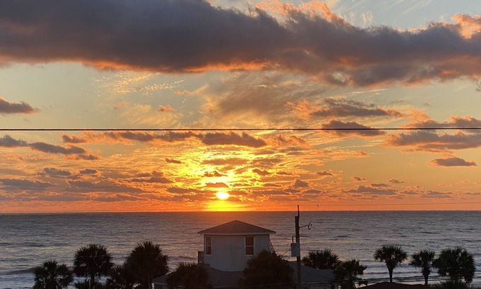 Bahama Beach Condo | Remodeled 3 BR/2BA condo steps to the beach! Sunset views and private garage.