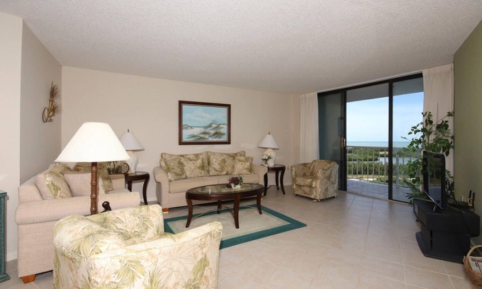 Marco Island Condo | South Seas Tower 4 #701 Looking at Sunset. Decorated with light pastel décor.