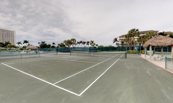 Marco Island House | Updated 2 Bed Condo Offering Long Beach Views From Balcony