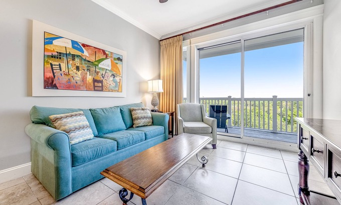 Baytowne Wharf Condo | Vibrant seventh-floor condo with pool, hot tub, sauna, private W/D & fast WiFi
