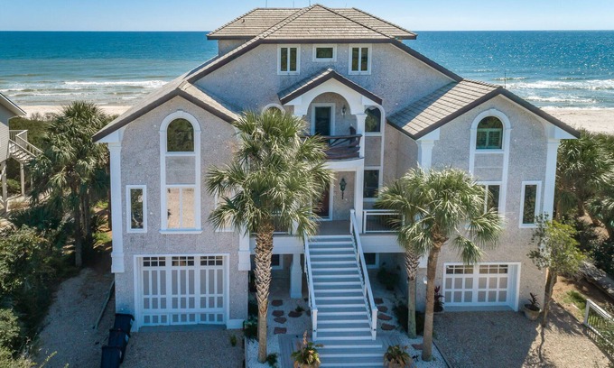 Plantation House | Welcome to Hidden Gem this stunning beachfront home is located in the gated community of the Plantation. Boasting 5 bedrooms and 5 bathrooms this home is perfect for large families that enjoy their own space.