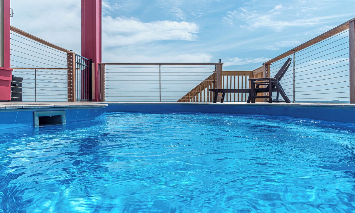 Fort Morgan House | Postcard views from your home equipped with a dream kitchen! Come enjoy luxurious living in a highly sought-after neighborhood in Fort Morgan.