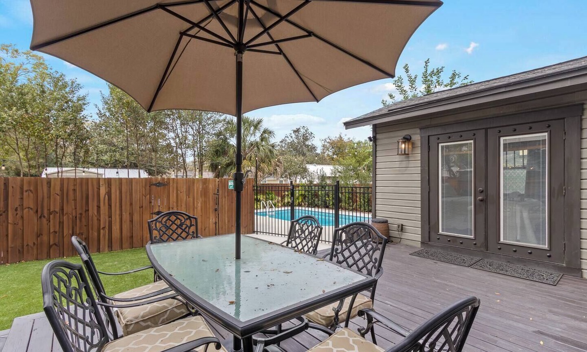 East Pensacola Heights House | Escape to your private castle! This 2BR cottage comfortably fits 4, featuring a private pool, fenced yard, and modern-rustic charm. Perfect for families or couples, it's dog-friendly and just 2 miles from Downtown and 10 miles from Pensacola Beach.