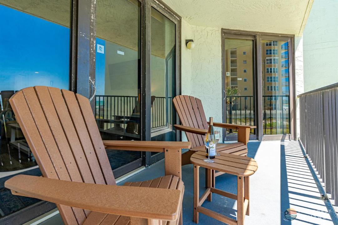 New Smyrna Beach Apartment | Ocean View Balcony just STEPS to the Beach with Pool, Parking and Wi-Fi!