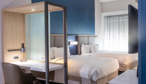 Queen Suite with Two Queen Beds and Trundle Sofa