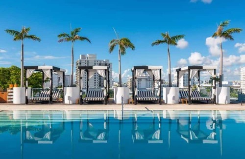 City Center Apartment | Ocean View Elegance | Rooftop Pool, Beach Access