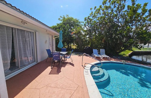 East Fort Lauderdale Apartment | Cozy Duplex overlooks the water and is within walking distance of the beach!