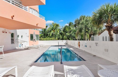 South of Fifth Condo | Modern Luxury Only Steps To The Sand! Huge Patio Deck, Modern Artwork & Extras