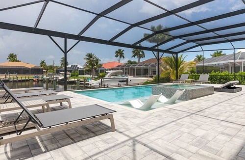 Pelican House | Luxury Gulf Access Villa | Pool, Spa & Dock