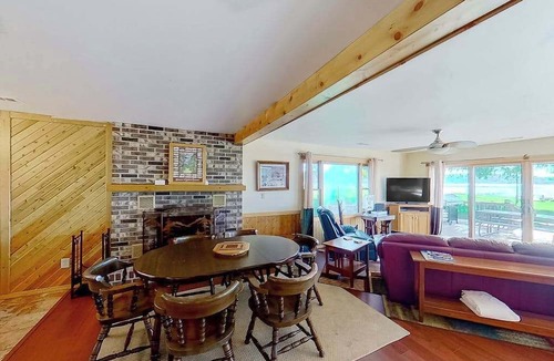 Onekama House | Remodeled, waterfront home on Portage Lake with dock & firepit - 2 dogs OK