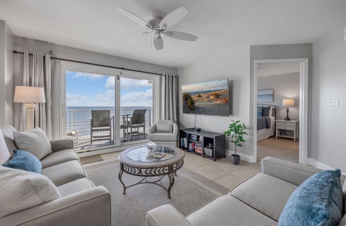Seawinds Condo Condo | Direct oceanfront penthouse 2/2 with gorgeous corner condo views, a heated pool, and garage