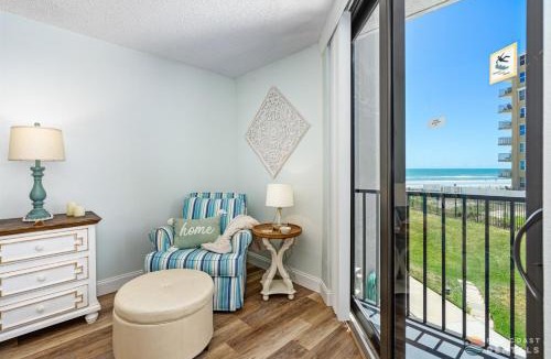 New Smyrna Beach Apartment | Ocean View Balcony just STEPS to the Beach with Pool, Parking and Wi-Fi!