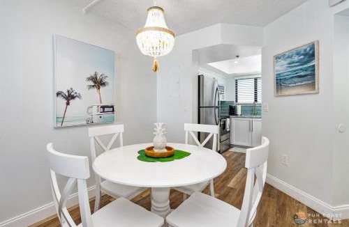 New Smyrna Beach Apartment | Ocean View Balcony just STEPS to the Beach with Pool, Parking and Wi-Fi!
