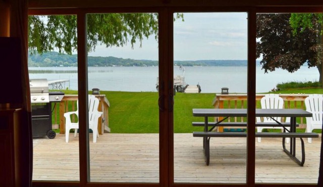 Remodeled, waterfront home on Portage Lake with dock & firepit - 2 dogs OK in Onekama