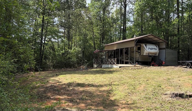 Escape to Toledo Bend in this cozy RV for the ultimate crappie fishing getaway!